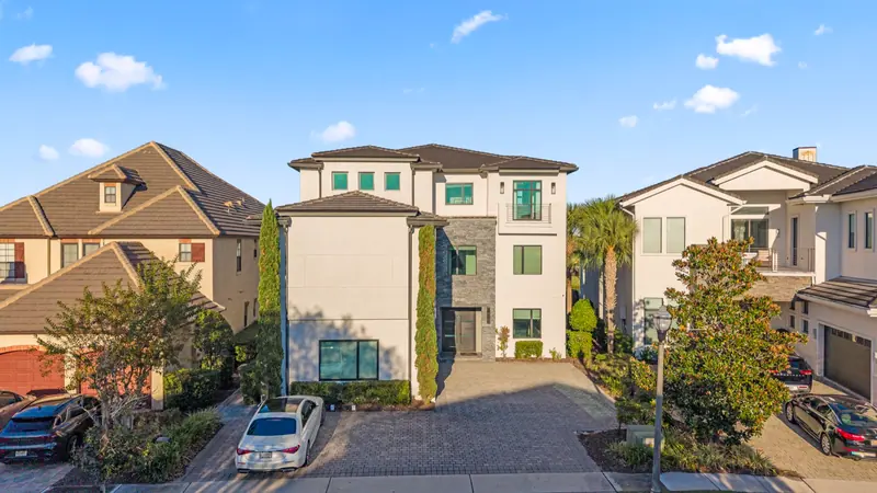 Modern Athena agent website showing a real estate professional and listing media